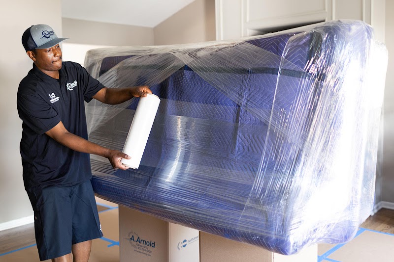A. Arnold Moving logo