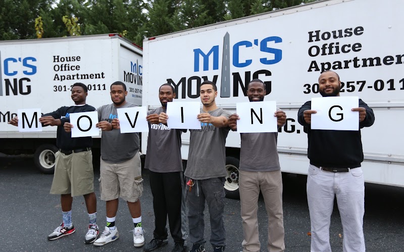 Mic's Moving Company logo