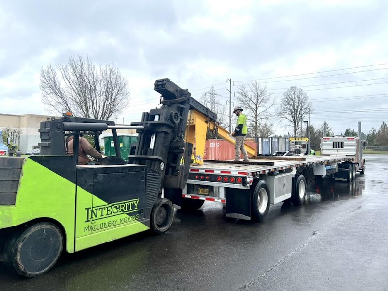 Integrity Machinery Moving logo