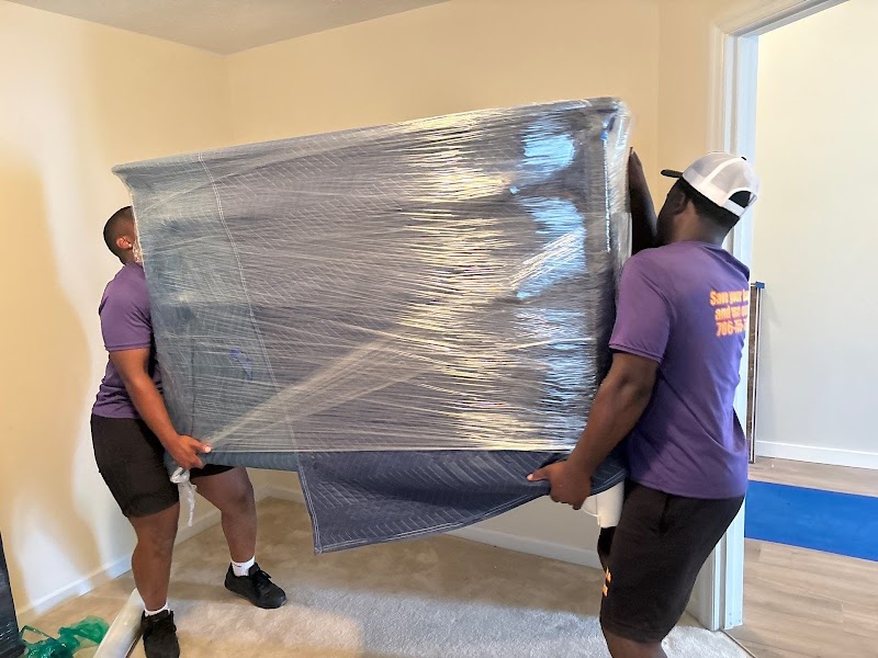 Hustle and muscle moving photo