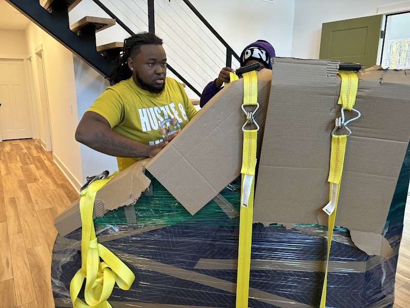 Hustle and muscle moving photo